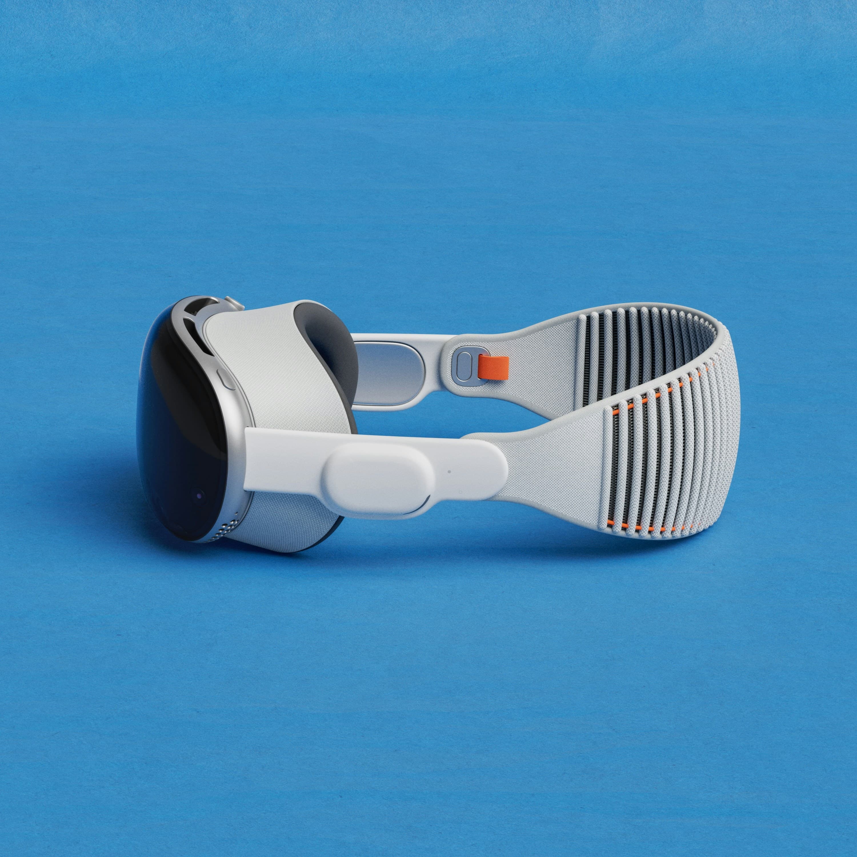 Paire de lunettes connectées posée sur une surface bleue, rendu évoquant un appareil de réalité augmentée
